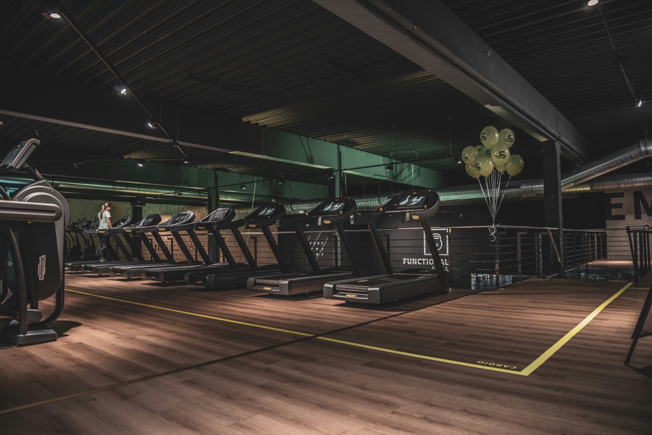 Cardio section with treadmills and ellipticals